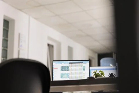 Portable computer with screen on with financial software Stock Photos