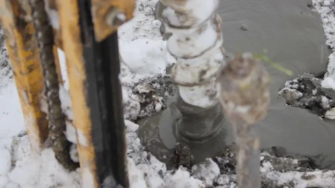 Portable drilling rig in action. Workers produces drilling to test soil. Video stock 72376069