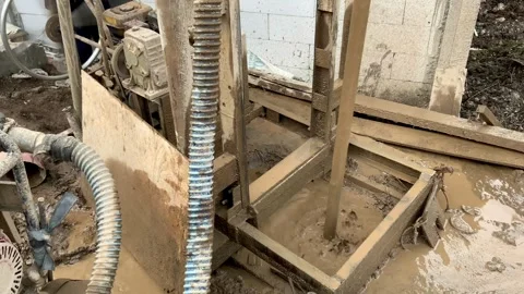 Portable drilling rig machine operating on a construction site for water well dr Stock Footage 336143834