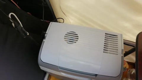 Portable Electric Cooler Box Running Inside a Canvas Camping Tent Interior Stock Footage 341983739