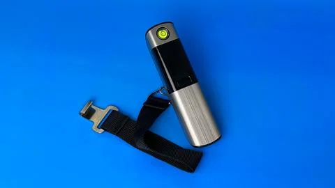 Portable electronic luggage scale with strap and bubble level Stock Photos