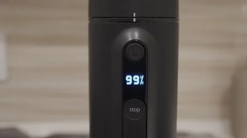 Portable Espresso Maker Finishes Brew Cycle, Announces Completion with Beep Stock Footage 321525865