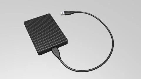 Portable external hard disk drive with USB cable on white background. Stockillustratie