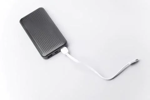 Portable external hard drive with usb cable on white background Stock Photos