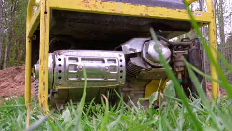 Portable gasoline generator operating on a construction site Stock Footage 196999081