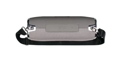 Portable grey speaker with the removable soft handle. Connect with smartphone Stock Photos