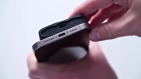 Portable Hard Drive and Mobile Phone for Digital Data Storage and Transfer Stock Footage 342583410