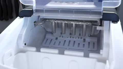 Portable ice machine creating ice cubes automatically Video stock 340899105