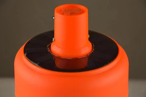 Portable orange lamp Stock Photos