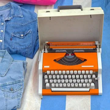 Portable Orange Typewriter Machine Photos