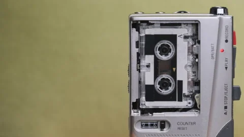 Portable Retro Tape Recorder with Micro Cassette Rec Sound on Yellow Background Vídeos de archivo 145792385