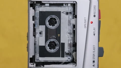 Portable Retro Tape Recorder with Micro Cassette Rec Sound on Yellow Background Vídeos de archivo 145805154