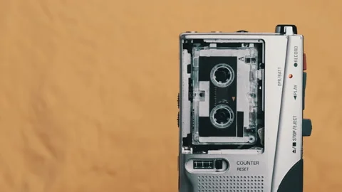 Portable Retro Tape Recorder with Micro Cassette Rec Sound on Yellow Background Vídeos de archivo 145808044