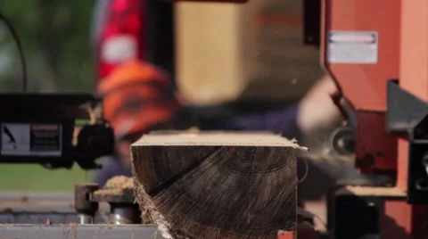 Portable sawmill cutting log from front CU Stock Footage 40472269