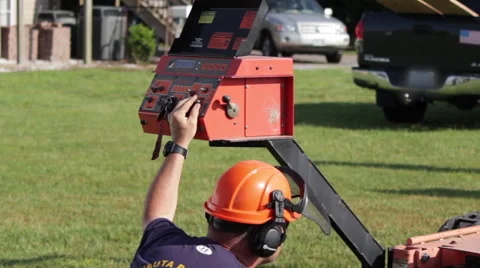 Portable sawmill operator controls machine Stock Footage 40472332