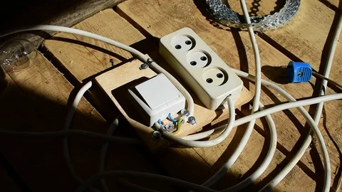 Portable socket, plugs the plug into a socket Stock Footage 117046738
