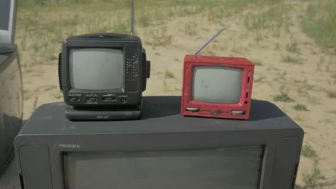 Portable soviet televisions at the shooting range Stock Footage 195095440