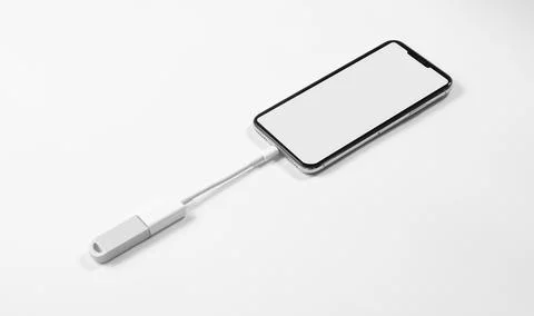 Portable USB flash drive connected to mobile phone isolated on white background Stock Photos