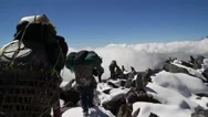 Porters On Snowy Ridgetop, Hongu, Nepal Stock Footage