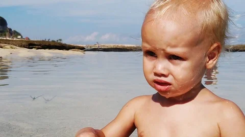 Portert is a two-year-old blond boy at sea. Stock Footage 108577806