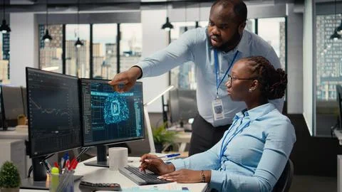 Portfolio managers using artificial intelligence to analyze stock market trends Stock Photos