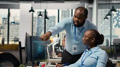 Portfolio managers using artificial intelligence to analyze stock market trends Stock Photos