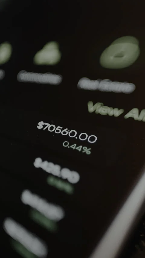Portfolio value of 70,560 US dollars and market performance change from a mobile Stock Footage 328881457
