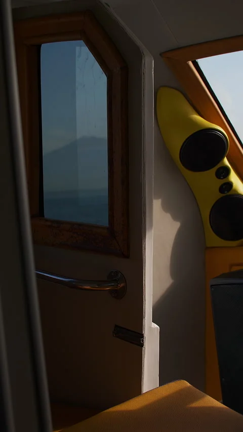Porthole in a ship overlooking the ocean Stock Footage 276689249