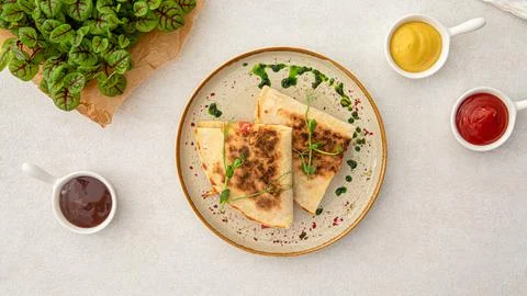 Portion of appetizer quesadilla with chicken Stock Photos