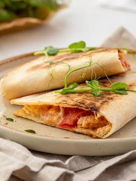 Portion of appetizer quesadilla with chicken Stock Photos