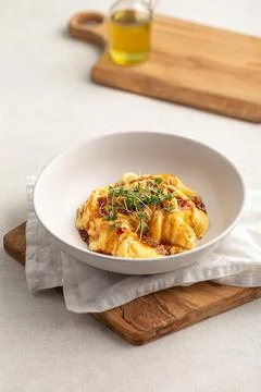 Portion of asian style scrambeled eggs with herbs Stock Photos