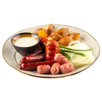 Portion of assorted sausages appetizer with sauce Stock Photos