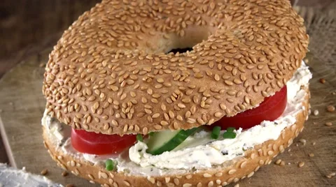 Portion of Bagels with Cream Cheese and vegetables (not loopable; 4K) Stock Footage 64009910