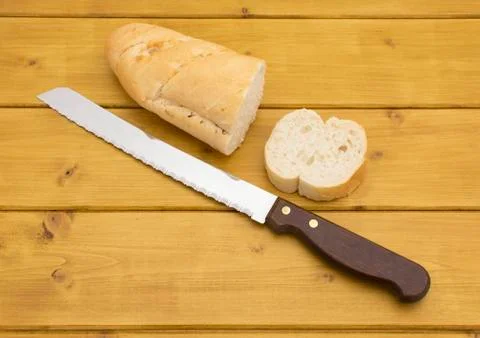 Portion of baguette with a slice cut off Stock Photos