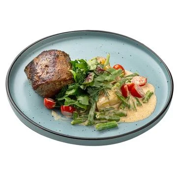 Portion of beef mignon steak with vegetables Stock Photos
