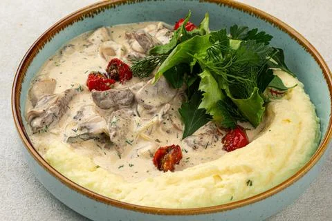 Portion of beef stroganoff with mashed potato Stock Photos
