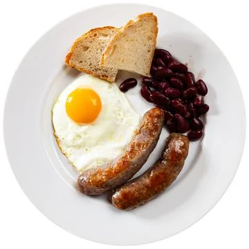 Portion of breakfast food is fried egg and pork sausage with stewed beans Stock Photos