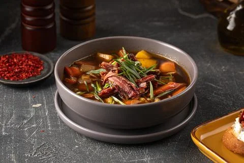 Portion of brisket rustic soup Stock Photos