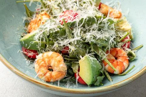 Portion of caesar salad with shrimp Stock Photos