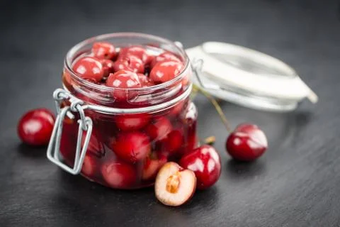 Portion of Canned Cherries , selective focus Stock Photos