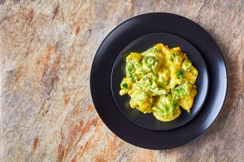Portion of Cheesy Broccoli bake on a plate Foto stock