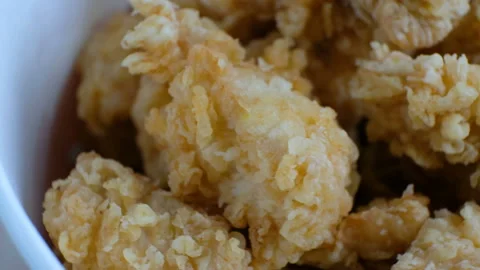 Portion of chiken nuggets, macro shot Stock Footage 102315114