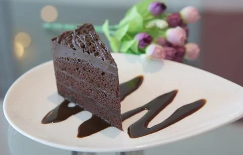 Portion of chocolate cake Фото