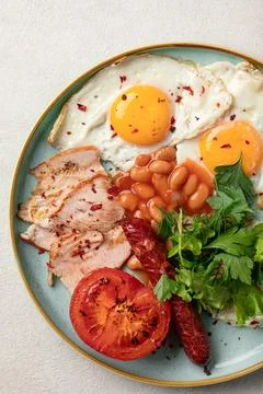 Portion of classic british breakfast with beans Stock Photos