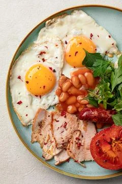 Portion of classic british breakfast with beans Stock Photos