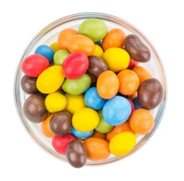 Portion of Cocolate coated Peanuts isolated on white Stock Photos