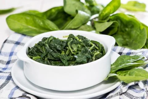 Portion of cooked spinach Stock Photos