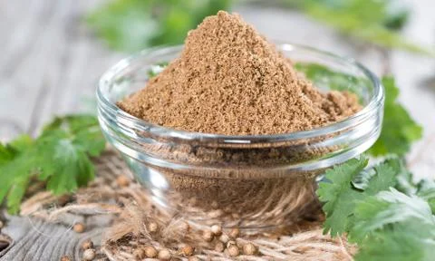 Portion of coriander powder Stock Photos