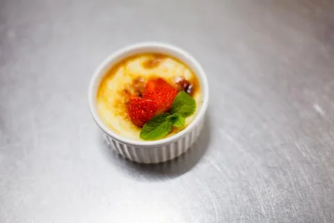 Portion of creme brulee dessert Stock Photos