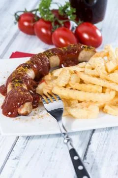 Portion of currywurst Stock Photos